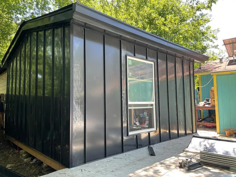 Black standing seam metal wall panels for Roof Inspection in Pequannock