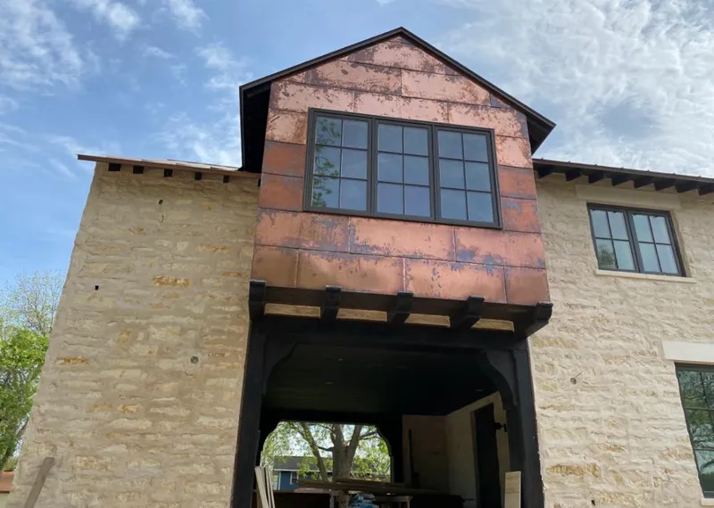 Copper metal panel facade on a stone building for Skylight Installation in Pequannock